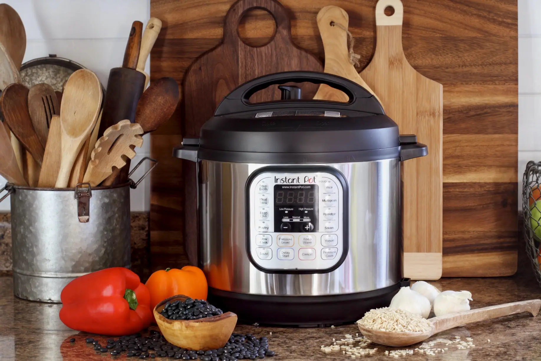 instant pot with peppers on a counter top